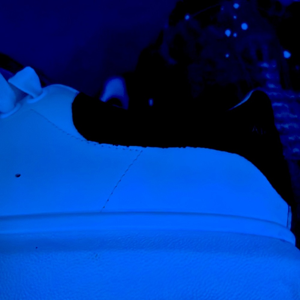 The shoes are white and black